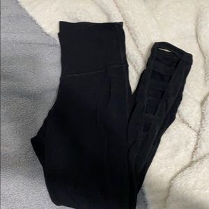 BLACK CROP LEGGING WITH CUTE SIDE CUT OUTS